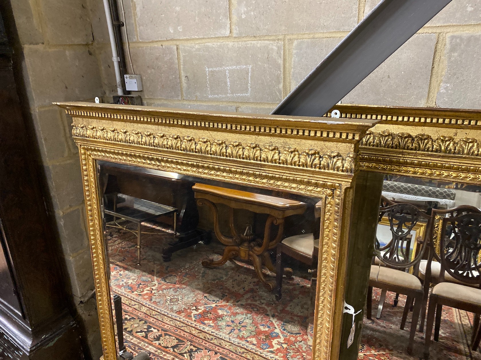 A pair of 19th century giltwood and composition overmantel mirrors, width 114cm, height 120cm